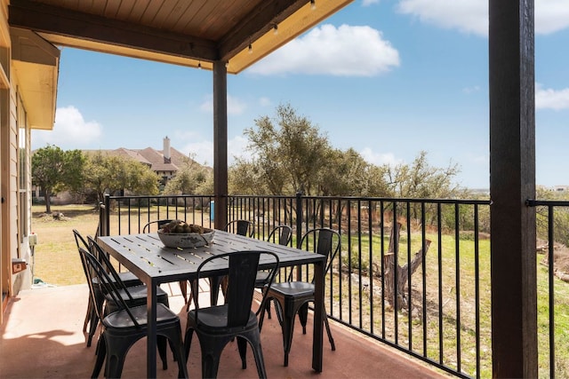 balcony with outdoor dining area