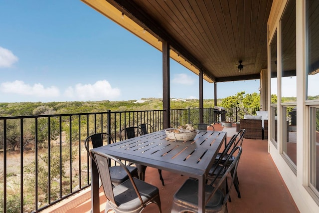 view of patio / terrace featuring outdoor dining area and ceiling fan