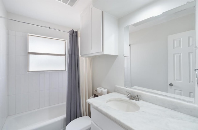 bathroom featuring shower / bathtub combination with curtain, toilet, visible vents, and vanity