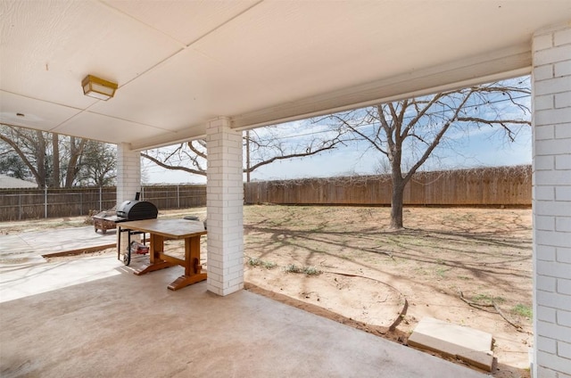 view of patio with a fenced backyard