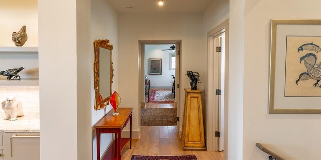 hallway featuring light wood-type flooring