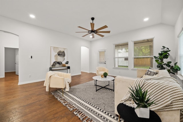 living room featuring recessed lighting, wood finished floors, arched walkways, and ceiling fan