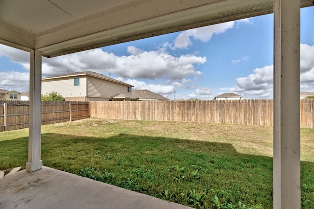 view of yard with a patio and a fenced backyard