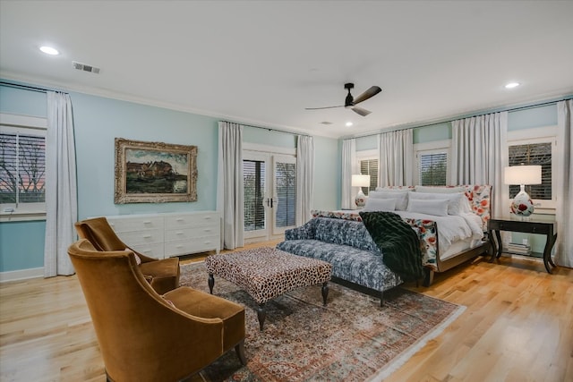 bedroom featuring visible vents, ceiling fan, recessed lighting, french doors, and wood finished floors