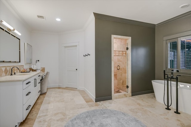 full bath featuring visible vents, baseboards, ornamental molding, and a shower stall