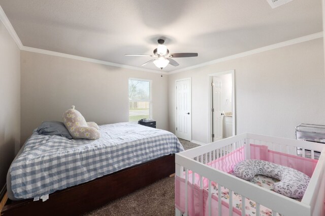 bedroom featuring ornamental molding, a ceiling fan, and carpet floors