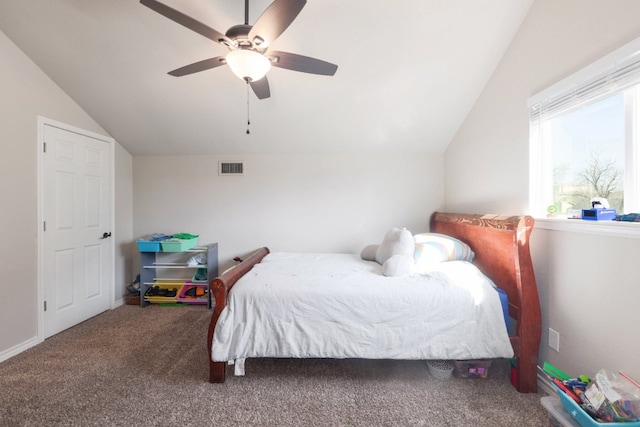 carpeted bedroom with visible vents, ceiling fan, baseboards, and lofted ceiling