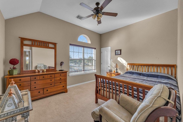 carpeted bedroom with visible vents, a ceiling fan, baseboards, and vaulted ceiling