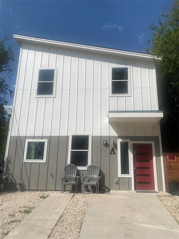 view of front of house featuring a patio and board and batten siding