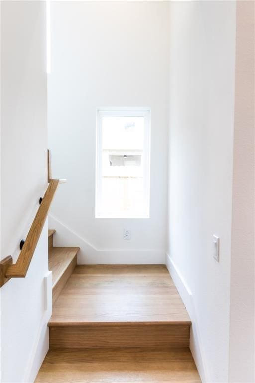409 W 35th St Unit B, Austin, TX 78705 - stairs featuring wood finished floors