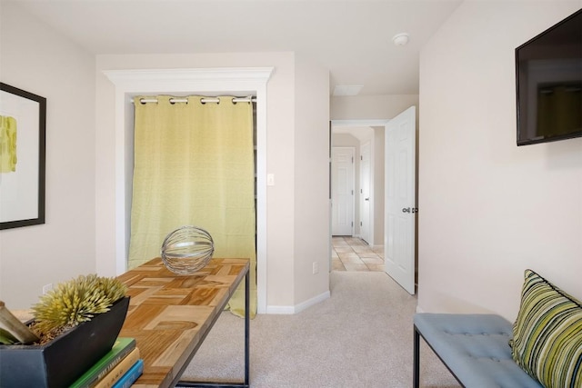 office featuring baseboards and carpet