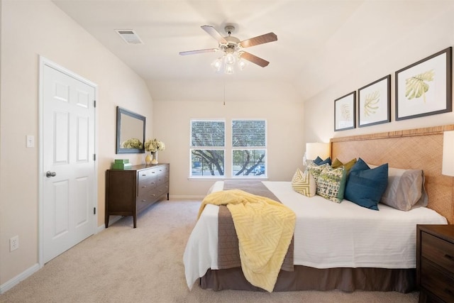 bedroom with visible vents, baseboards, lofted ceiling, light colored carpet, and ceiling fan