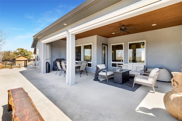 view of patio / terrace featuring an outdoor living space and a ceiling fan