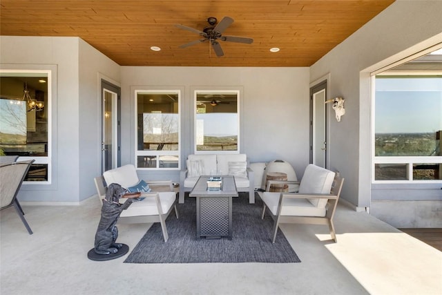 view of patio featuring a ceiling fan and an outdoor hangout area