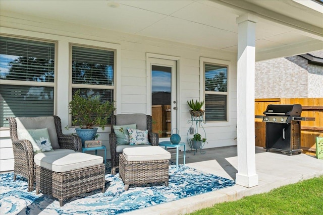 view of patio / terrace featuring an outdoor living space and a grill