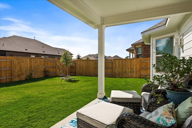 view of yard featuring a fenced backyard