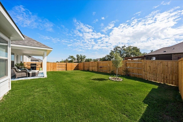 view of yard featuring a fenced backyard