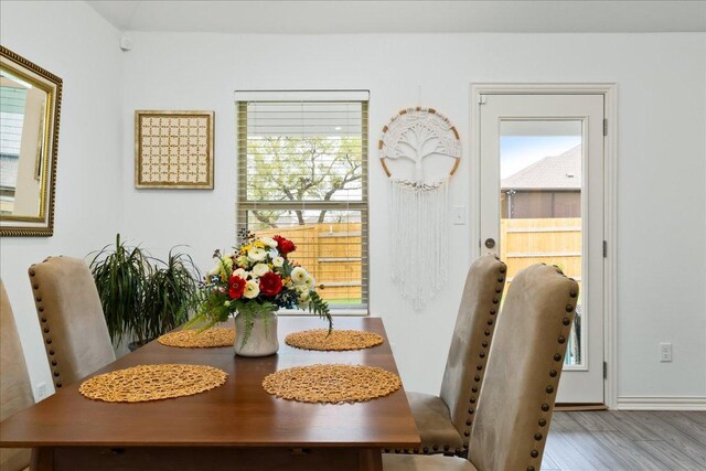 dining room with wood finished floors