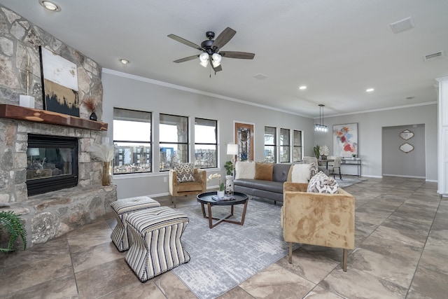 living area featuring a stone fireplace, crown molding, baseboards, and visible vents