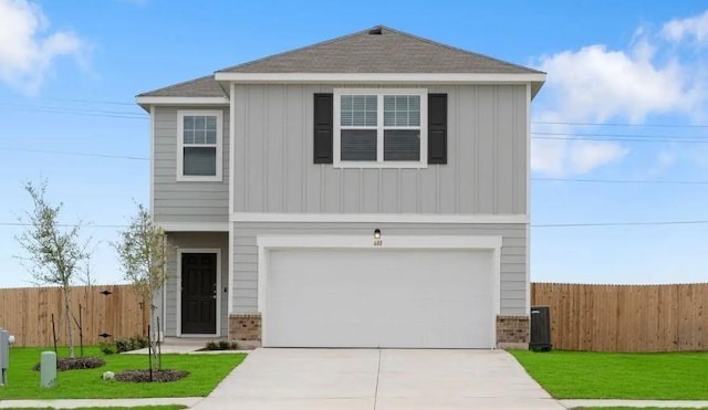 view of front of property featuring brick siding, driveway, and fence