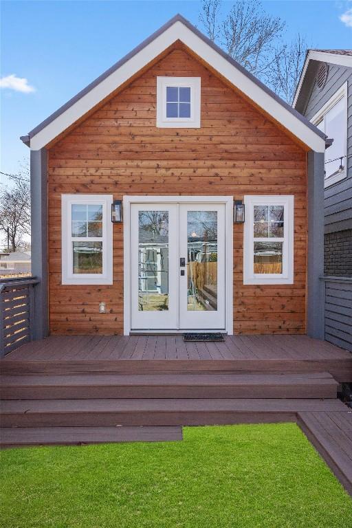 back of house featuring french doors