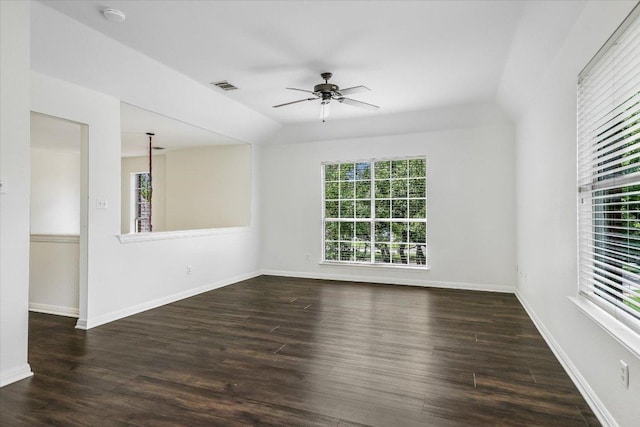 unfurnished room featuring visible vents, baseboards, ceiling fan, and wood finished floors