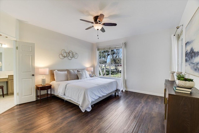 bedroom featuring ceiling fan, baseboards, and wood finished floors