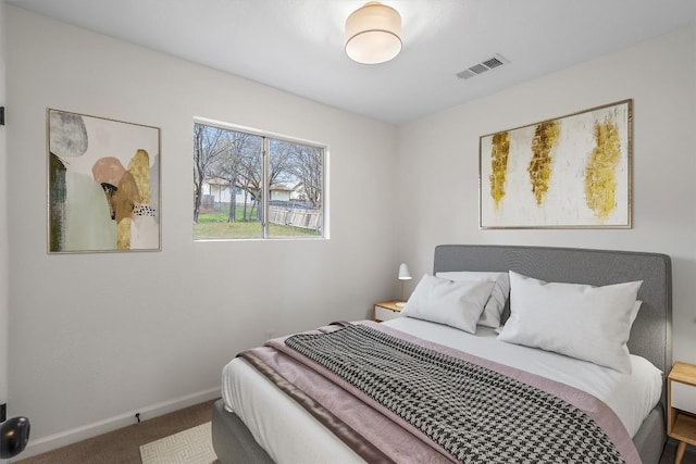 bedroom featuring carpet flooring, baseboards, and visible vents