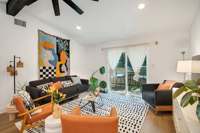 living room featuring recessed lighting, vaulted ceiling with beams, wood finished floors, and visible vents