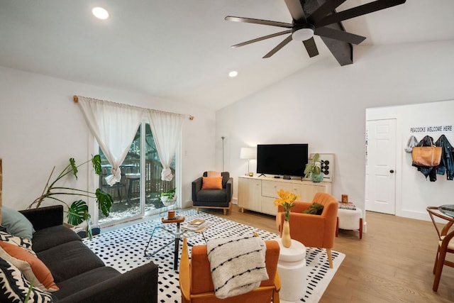 living area featuring baseboards, lofted ceiling with beams, recessed lighting, wood finished floors, and a ceiling fan