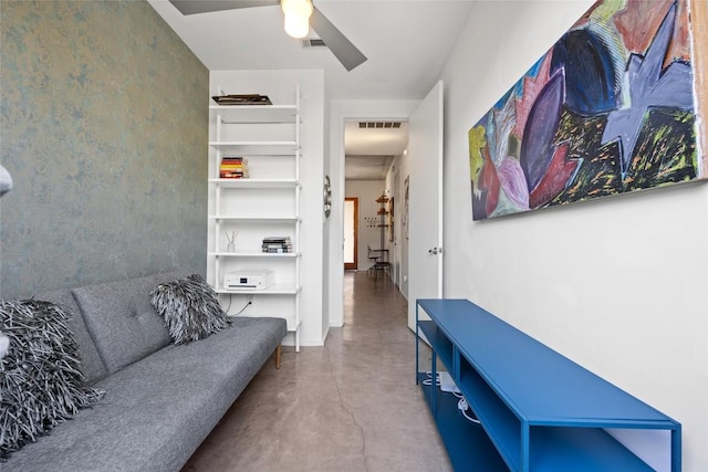 2301 S 5th St Unit 25, Austin, TX 78704 - living room with concrete flooring and a ceiling fan