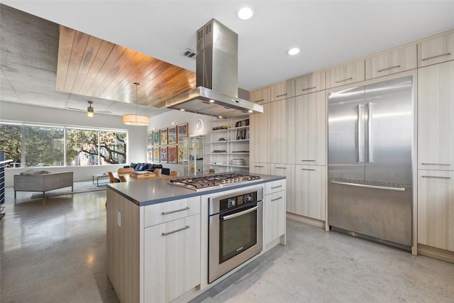 kitchen featuring finished concrete flooring, island exhaust hood, stainless steel appliances, dark countertops, and modern cabinets