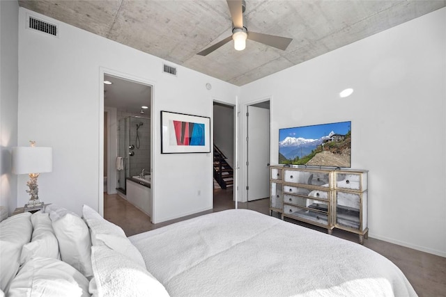 bedroom featuring baseboards, visible vents, ensuite bath, and ceiling fan