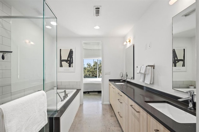 ensuite bathroom featuring visible vents, a shower stall, double vanity, a bath, and a sink