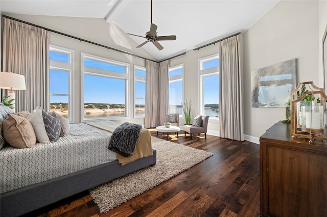 bedroom with baseboards, beamed ceiling, wood finished floors, high vaulted ceiling, and a ceiling fan