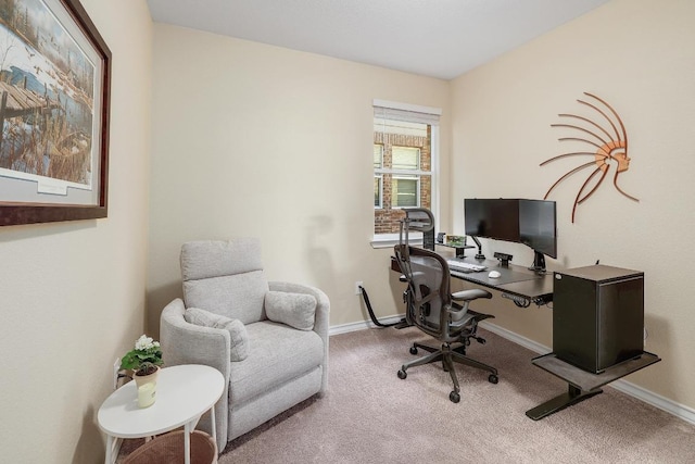 carpeted home office with baseboards