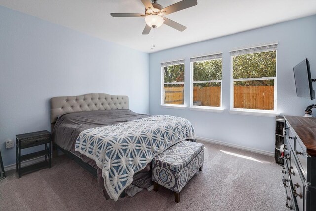 7505 Albany Dr, Austin, TX 78754 - carpeted bedroom featuring baseboards and a ceiling fan