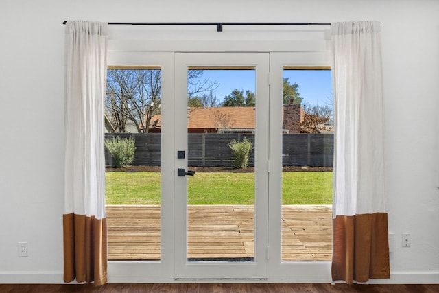 entryway with a healthy amount of sunlight and baseboards