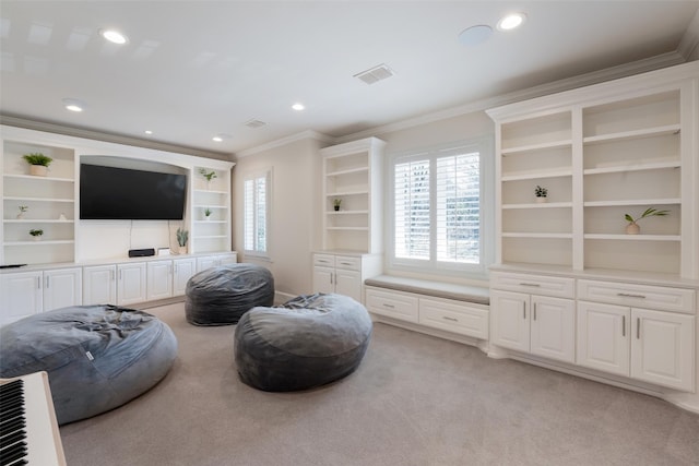 living room with ornamental molding, recessed lighting, visible vents, and light carpet