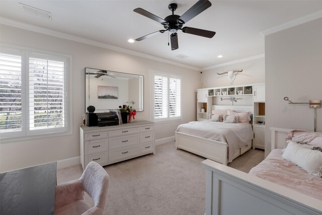 bedroom featuring visible vents, light colored carpet, crown molding, and baseboards