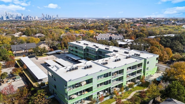 birds eye view of property featuring a city view