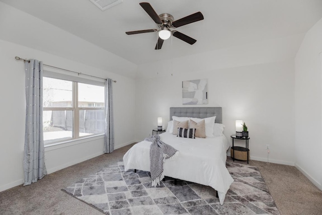 bedroom featuring visible vents, baseboards, ceiling fan, and carpet flooring