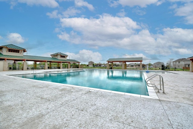 pool with a patio area