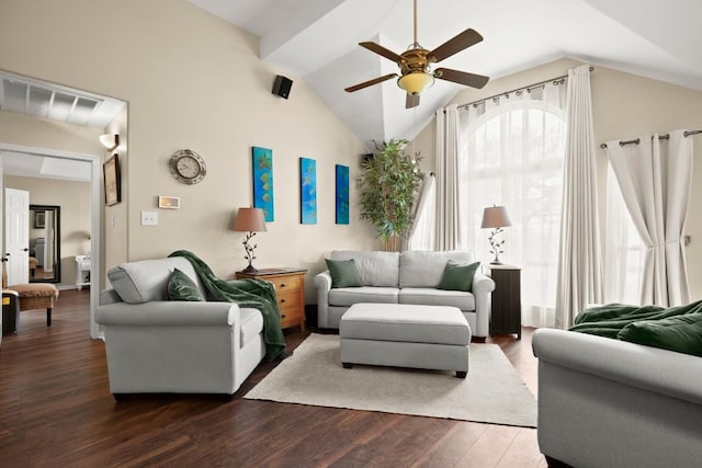 living room featuring a ceiling fan, lofted ceiling, and wood finished floors