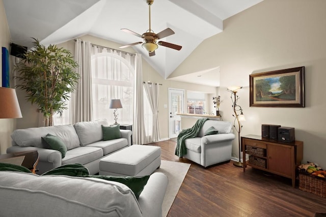 living room with lofted ceiling, ceiling fan, and dark wood-style flooring