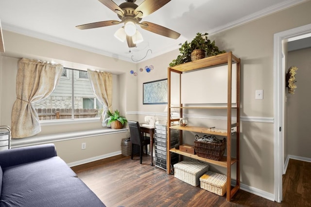 office featuring baseboards, wood finished floors, and ornamental molding