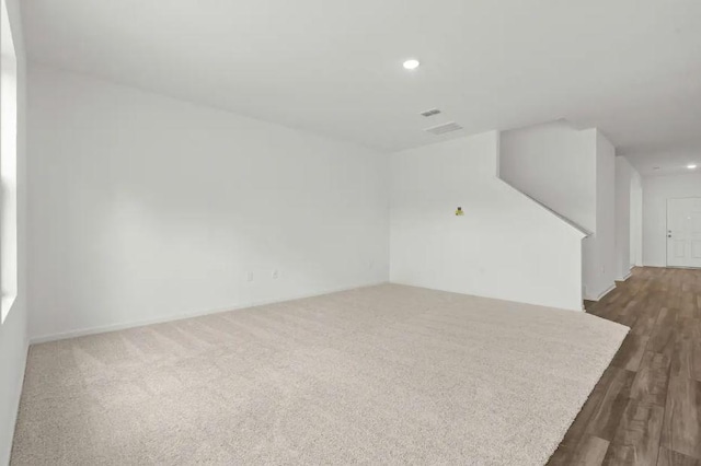 1424 Morris Loop, San Marcos, TX 78666 - unfurnished living room with recessed lighting and dark wood-type flooring