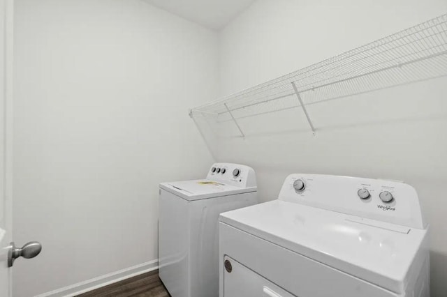 1424 Morris Loop, San Marcos, TX 78666 - washroom with independent washer and dryer, baseboards, and dark wood-style floors