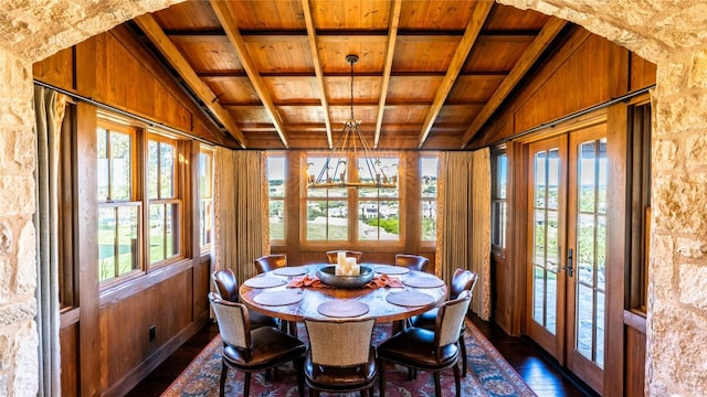 dining room featuring french doors, wood ceiling, and lofted ceiling with beams