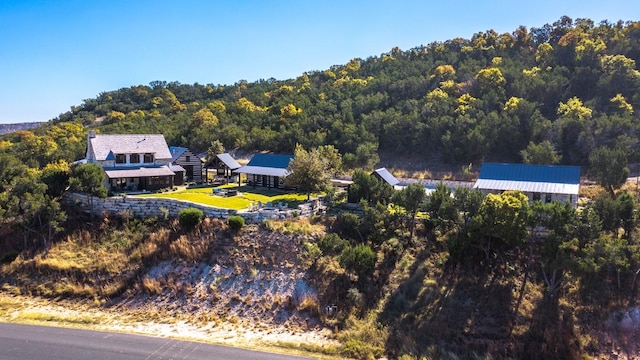 bird's eye view with a view of trees